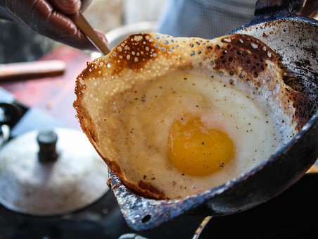 Sri lankan egg hopper freshly cooked - Ella, Sri Lanka Sri lankan egg hopper freshly cooked - Ella, Sri Lanka